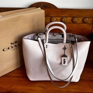COACH 1941 Ice Pink Rogue tote with floral bow interior